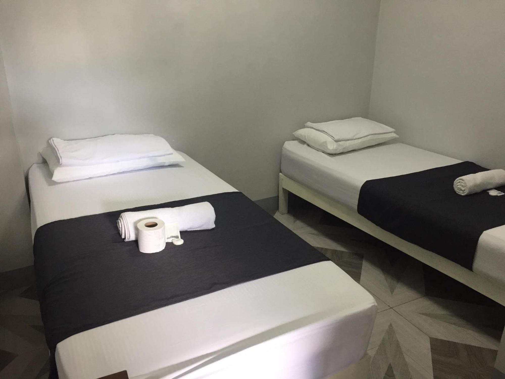 Ziet Hotel Mambajao Rum bild